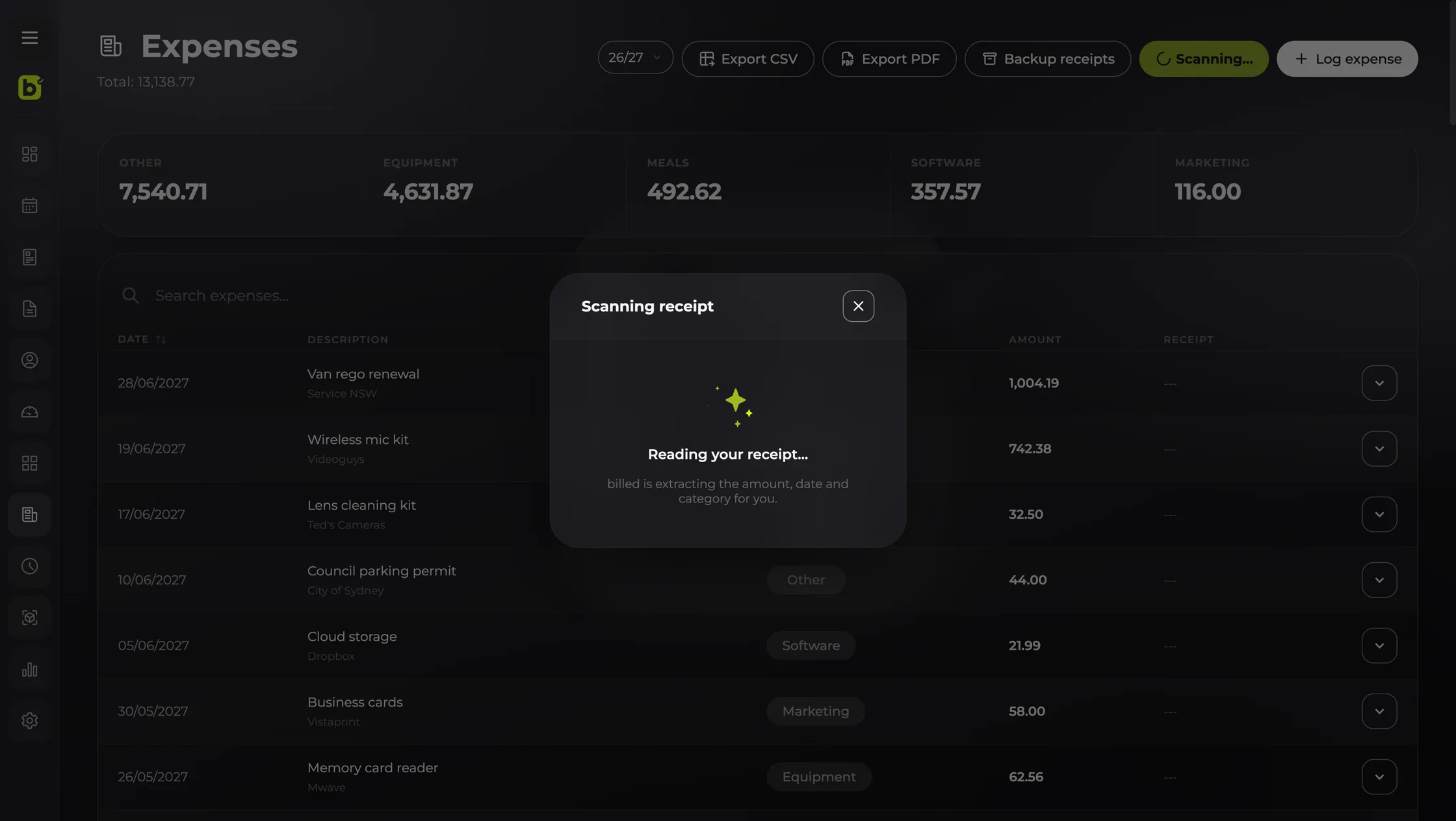 The billed expenses screen while a receipt is being scanned: billed reading the amount, date and category from the photo, with expense totals by category above